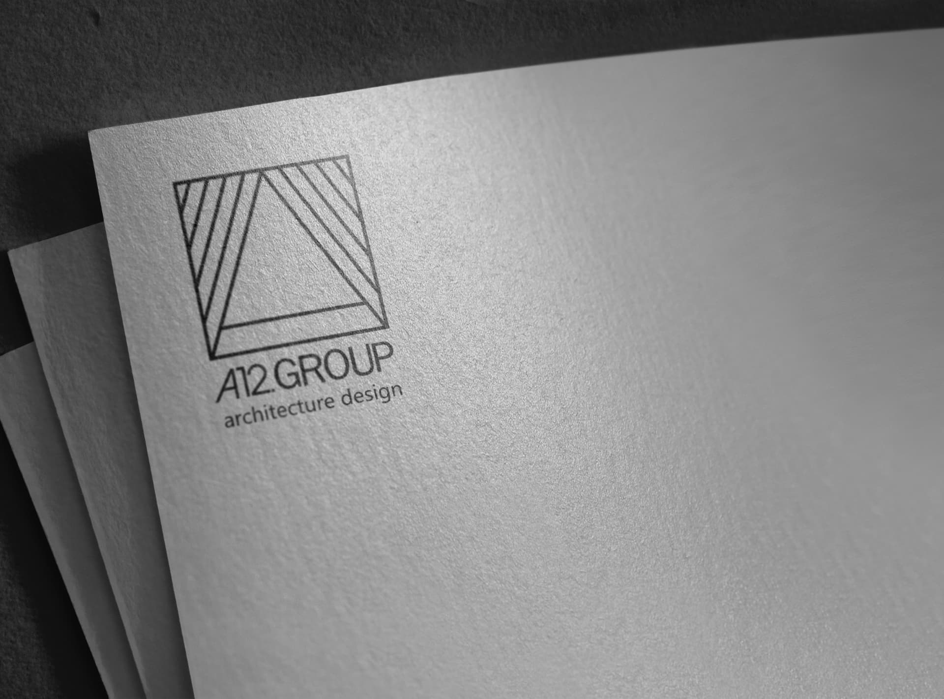 Логотип A12.Group на фирменном бланке